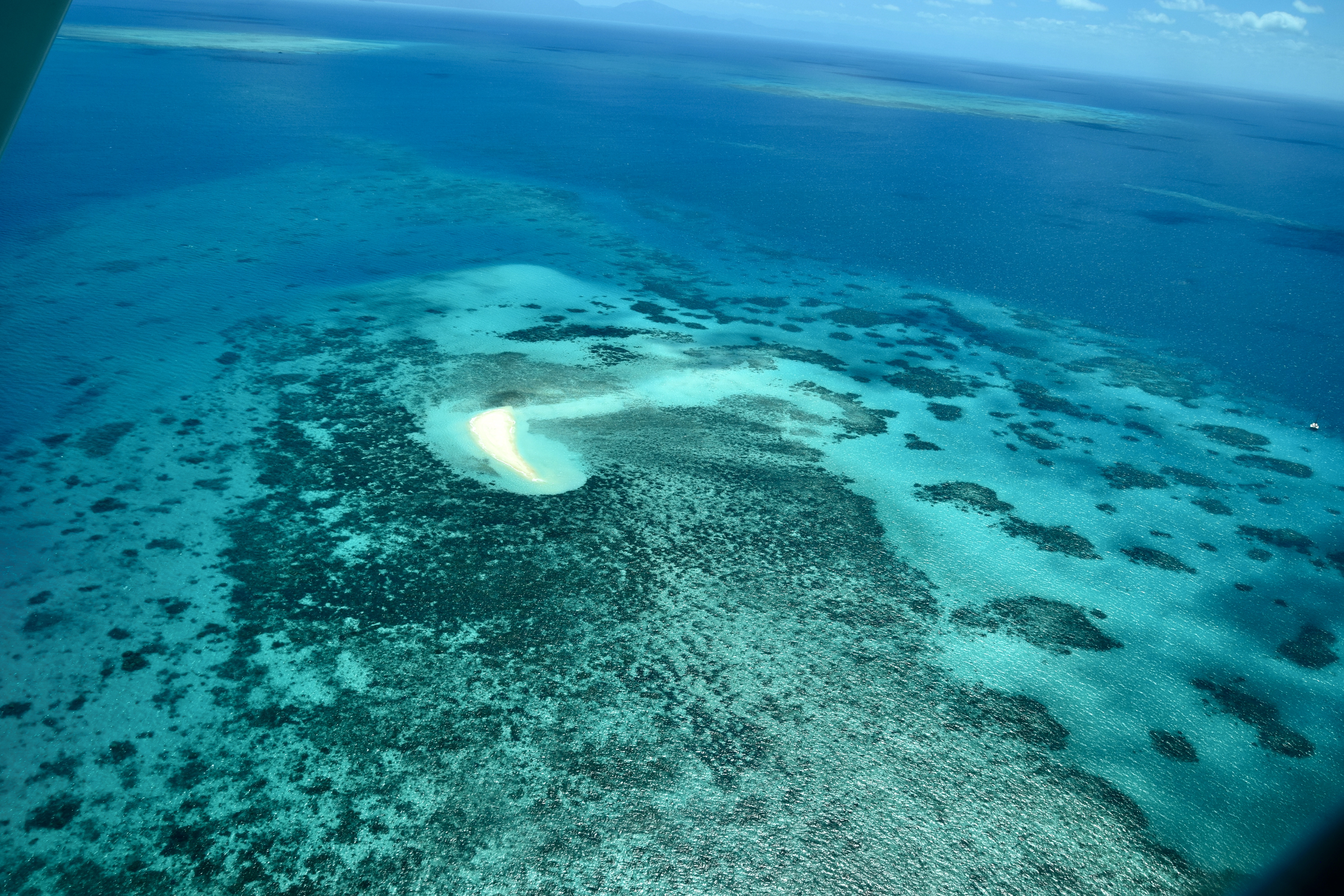 Aerial view of coral formations across the Great Barrier Reef, Queensland