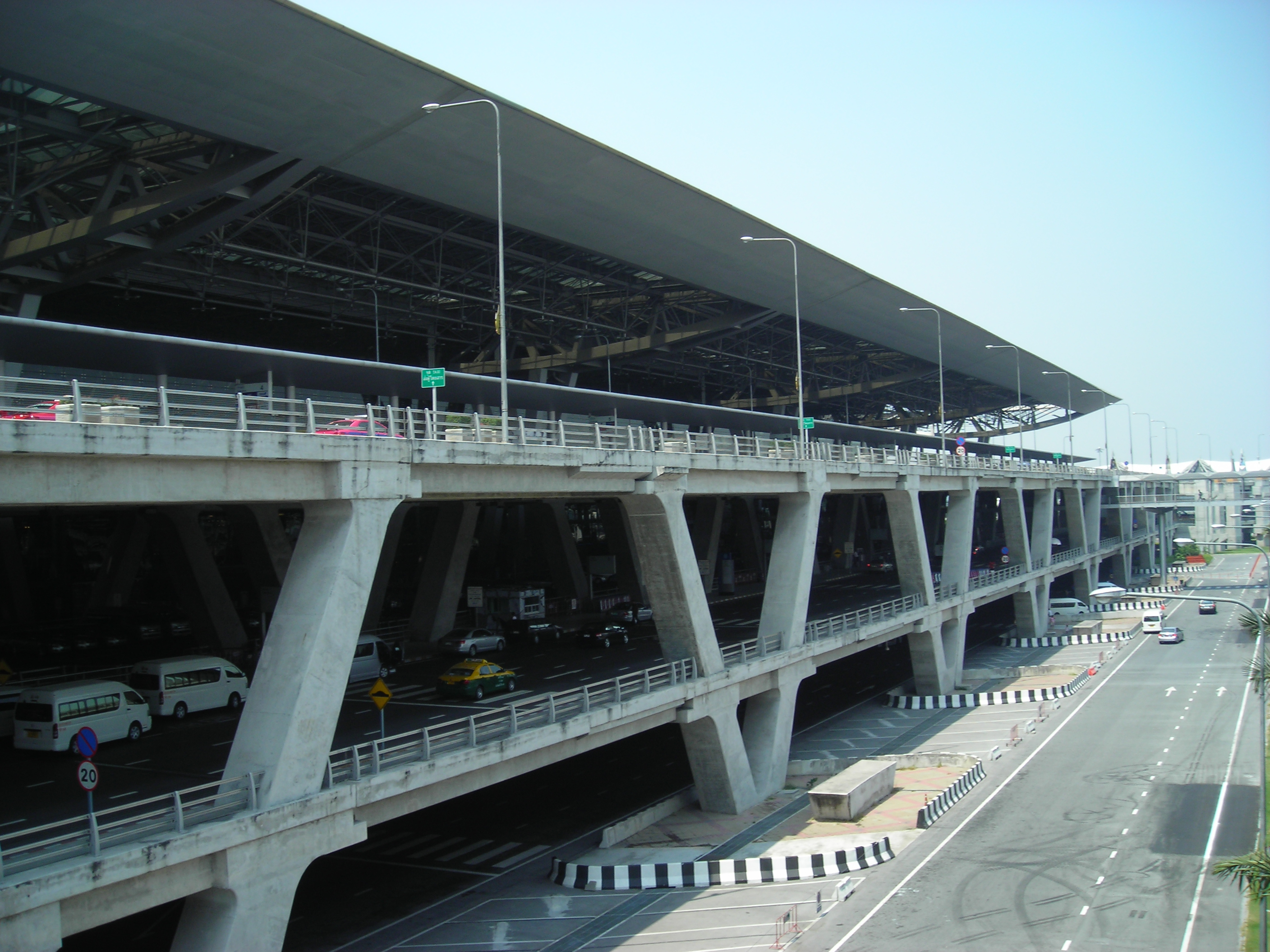 The passenger terminal building at Suvarnabhumi Airport, seen from the car park