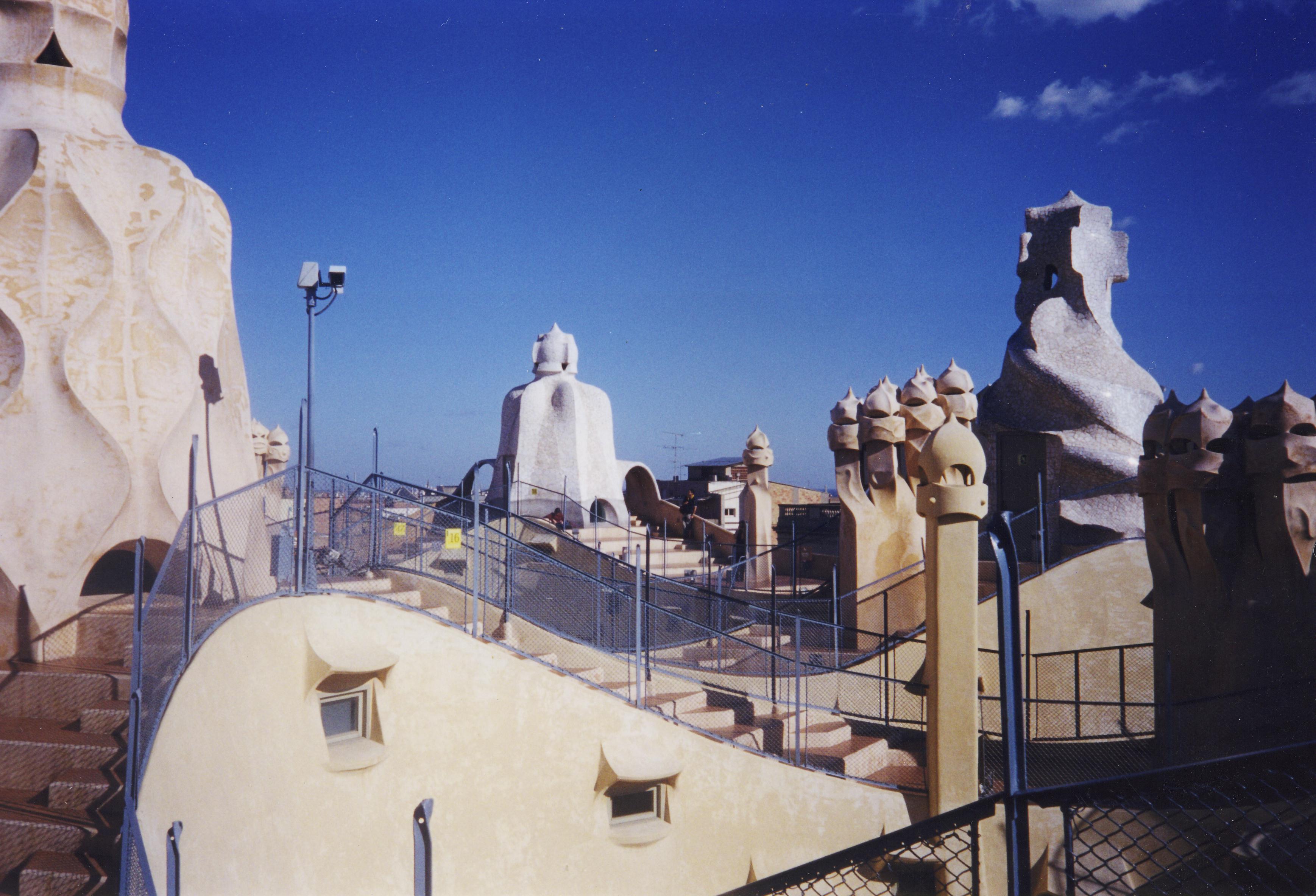 The sculptural rooftop chimneys of La Pedrera (Casa Milà) on Passeig de Gràcia, free to see from the street on this loop