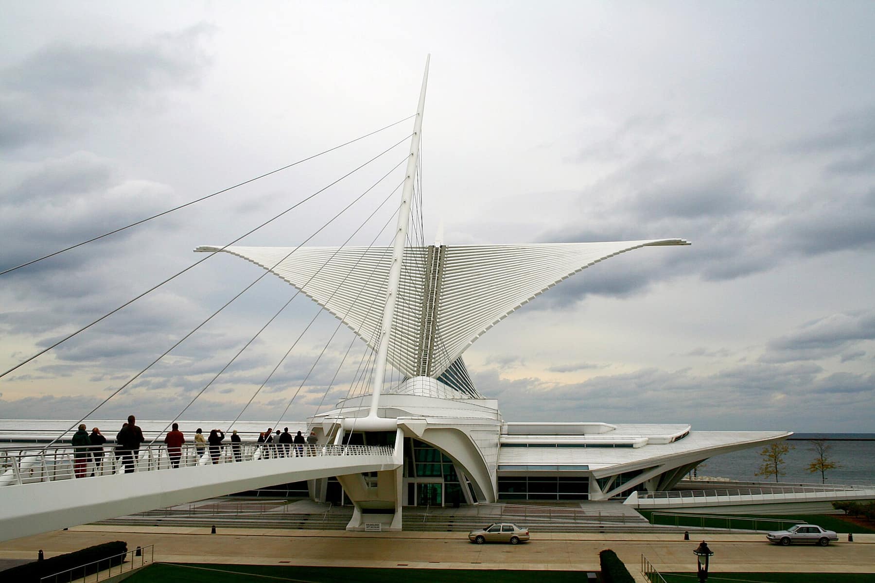 The Milwaukee Art Museum’s white Quadracci Pavilion, with its wing-like sun screen raised, beside Lake Michigan