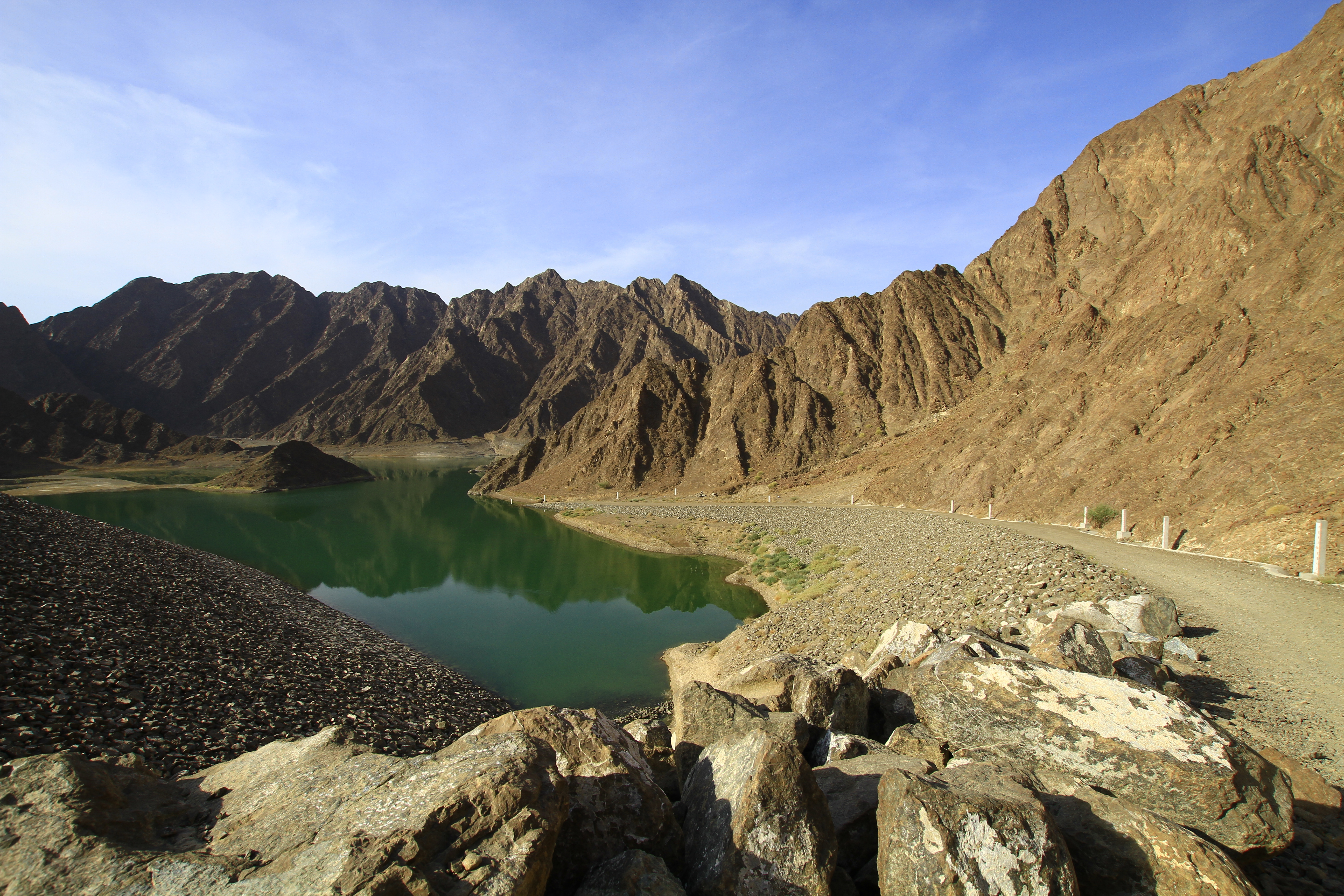Hatta Dam, its turquoise water set against the Hajar Mountains