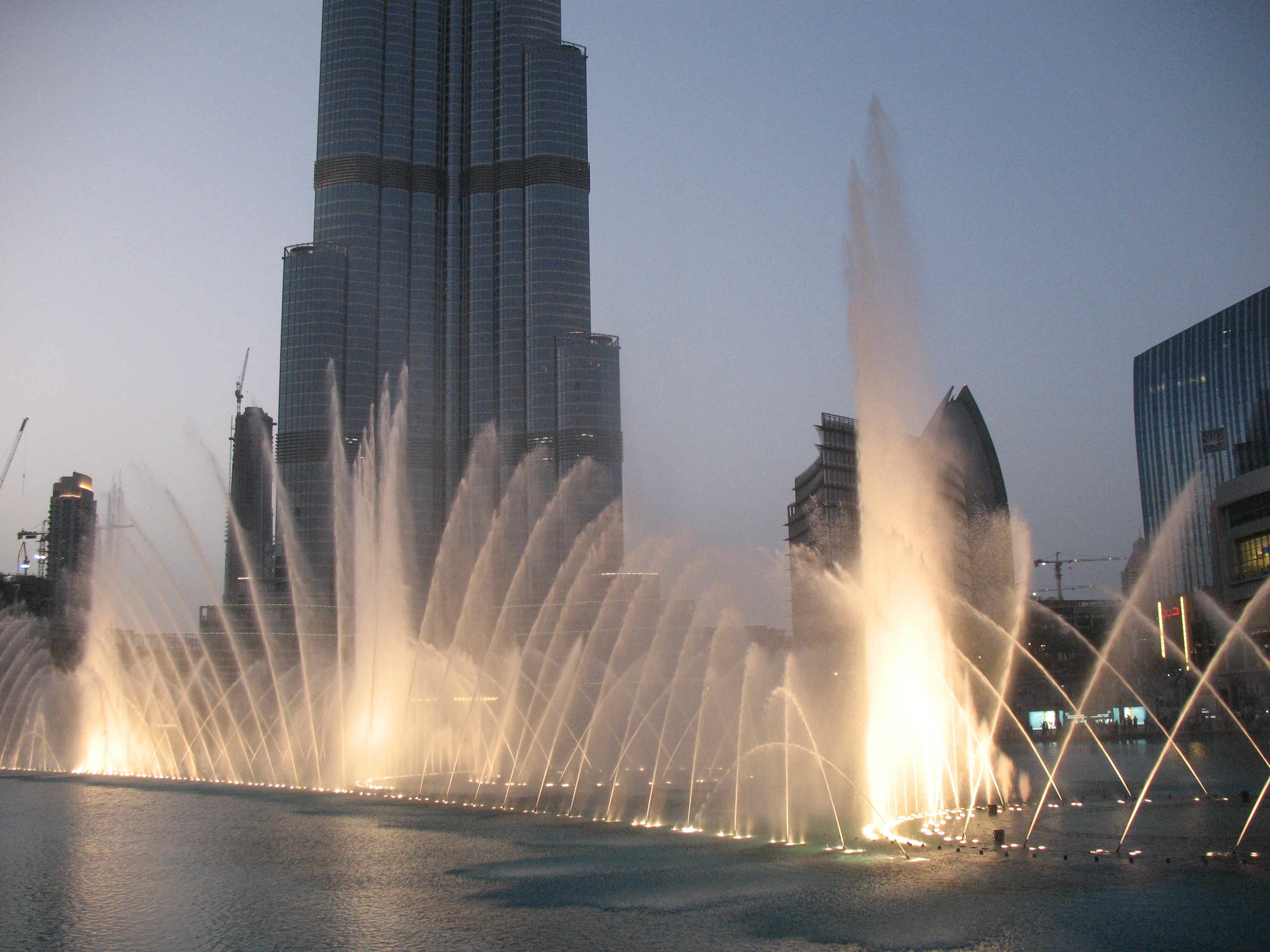 The Dubai Fountain performing on Burj Lake, free to watch from the promenade, Downtown Dubai