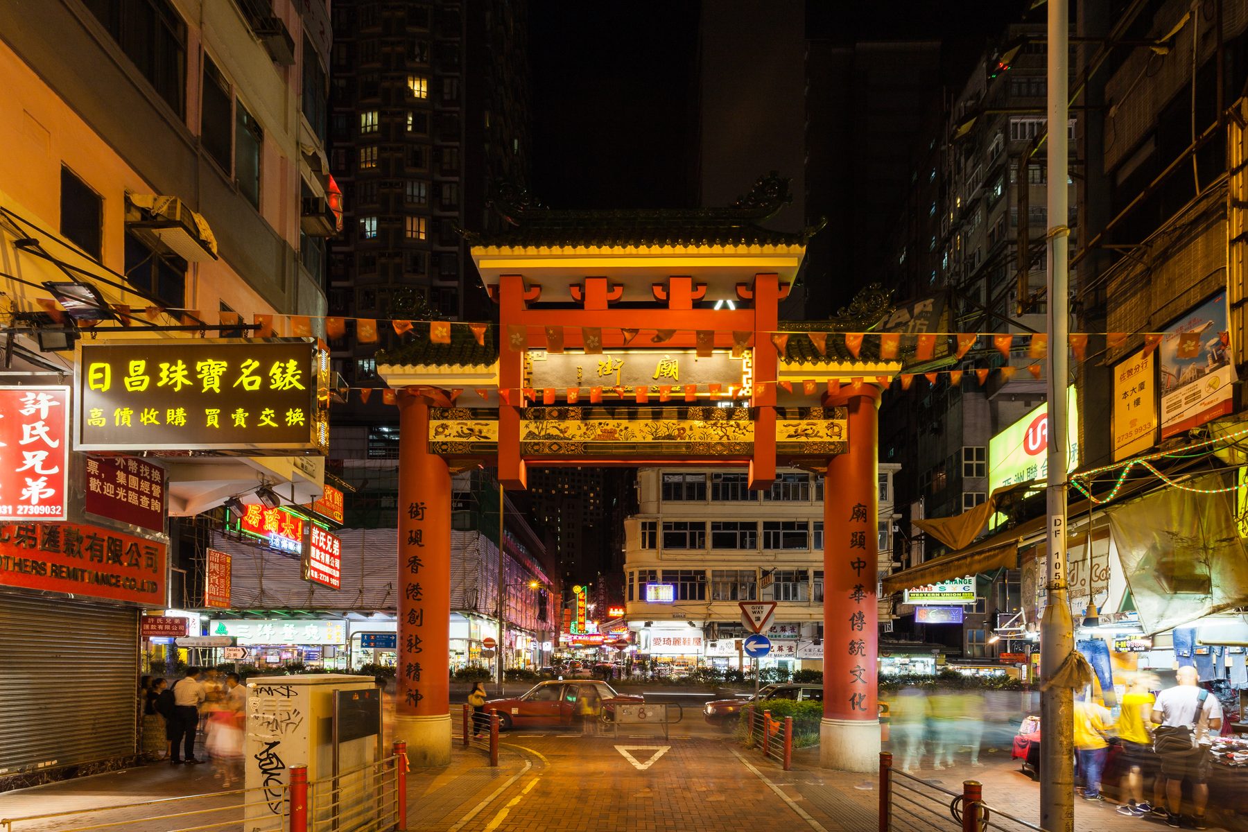 Stalls and shoppers on Temple Street Night Market, Kowloon