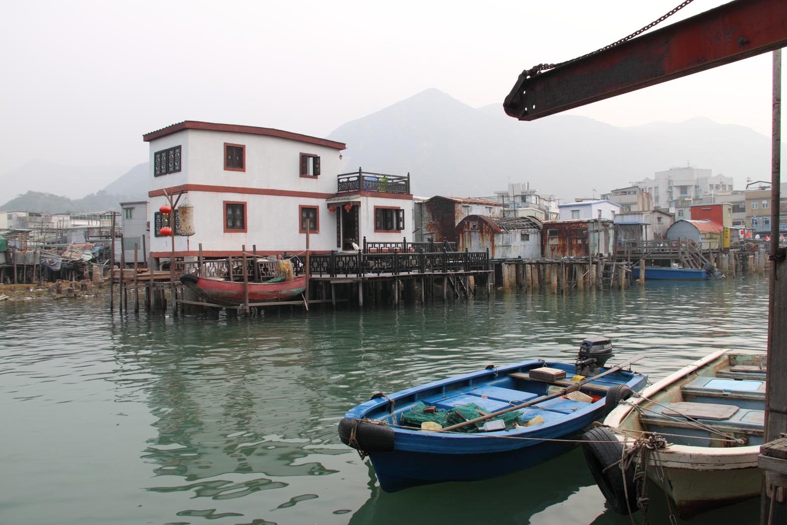 Wooden stilt houses built out over the tidal channel in Tai O, Lantau Island