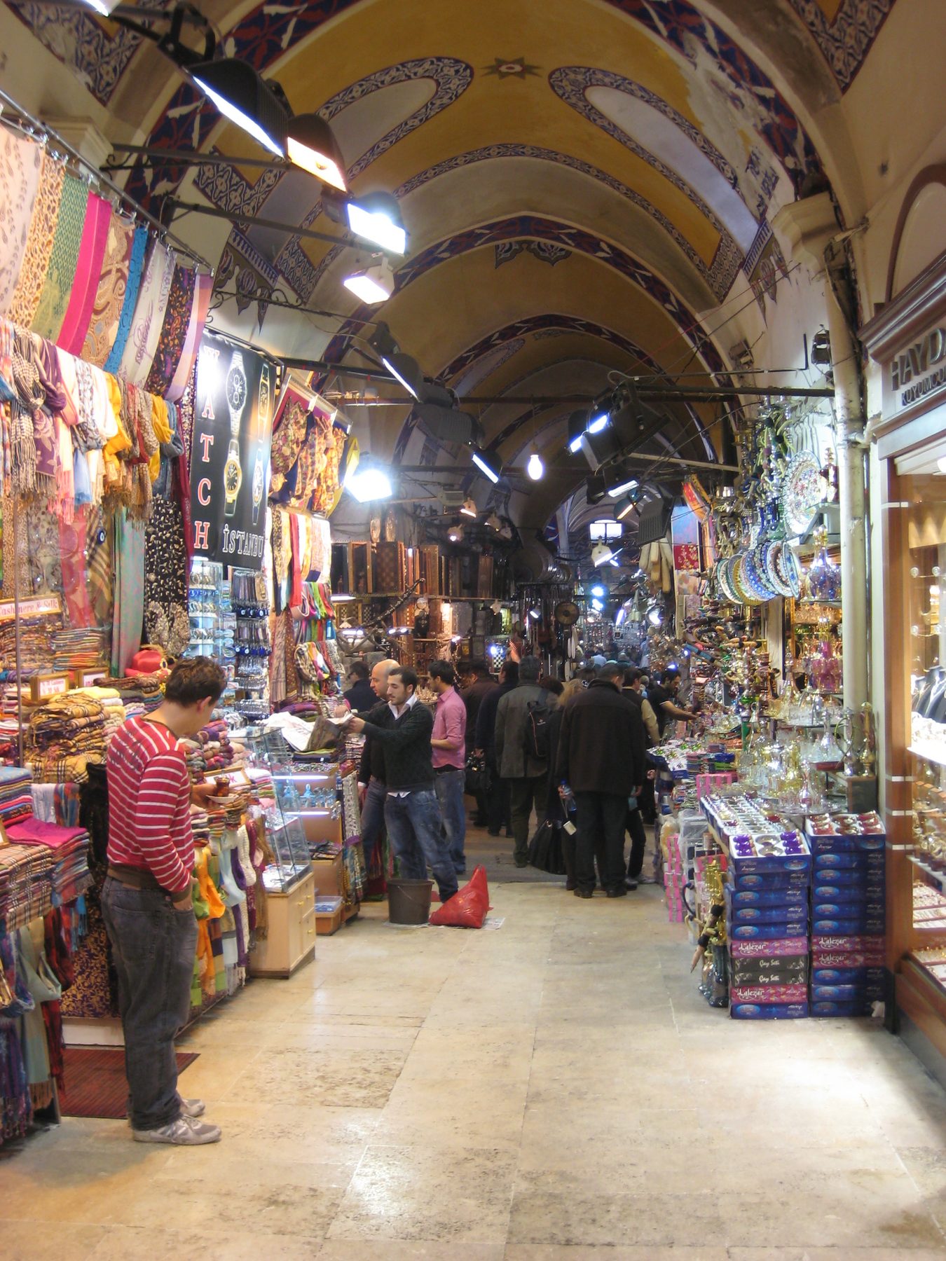 A covered vaulted lane of shops inside the Grand Bazaar, Istanbul