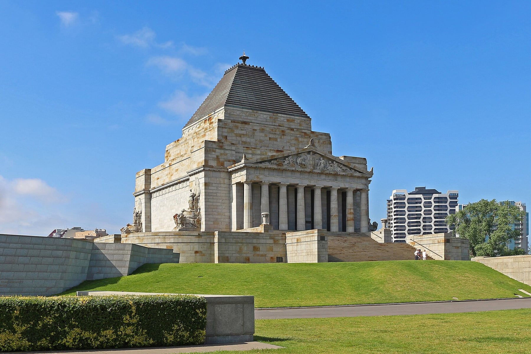 The Shrine of Remembrance on its grassy rise in Melbourne, with a stepped pyramid roof and a columned portico